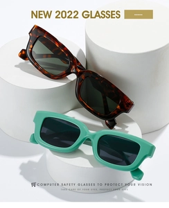 Detail of chunky tortoise shell and mint green square frames for computer protection