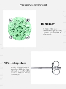Detail of S925 silver stud earrings featuring mint green zircon and four-prong setting