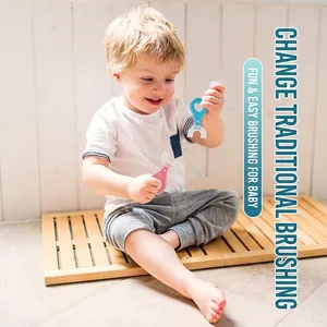 Toddler U-shaped toothbrush set in pink and blue with heart-shaped handle for baby oral care