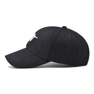 Close-up of premium 3D NY embroidery on black cotton twill baseball cap fabric