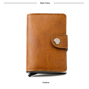 Front view of brown leather RFID blocking wallet with pop-up aluminum card holder