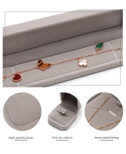 Detail view of premium grey velvet jewelry boxes with fine lining and rounded corners