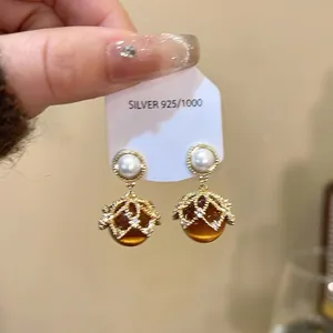 18K gold plated silver stud earrings with pearls and vintage cat eye stones