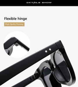 Detail of round sunglasses featuring flexible metal hinges and star rivets on the temple
