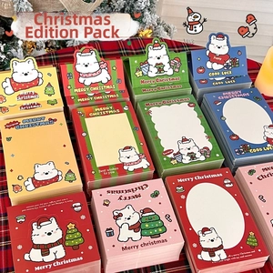 Close-up of cute Christmas dog packaging cards with colorful holiday dog illustrations