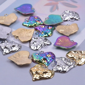 Polished 18k gold and silver heart charms with irregular textures for DIY necklaces