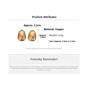 Detailed view of gold petal earrings with pearls, copper material and silver needle pins