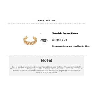 Detail view of 18k gold plated copper ring featuring zircon inlay and chain link design