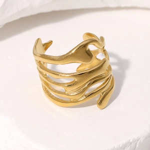 Detail view of the golden irregular hollow layered ring with organic fluid design