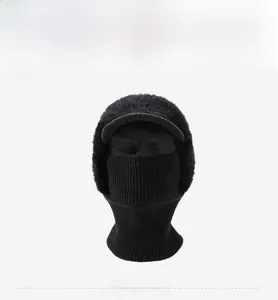 Detail of black knitted balaclava with fleece lining and visor for extreme cold