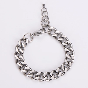 Detailed view of silver stainless steel chain bracelet with lobster clasp and extension
