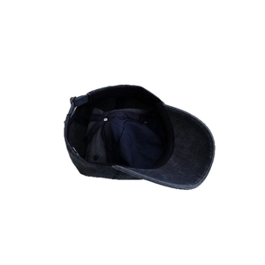 Navy blue washed cotton baseball cap with adjustable metal buckle and interior sweatband