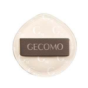 Tear-drop shaped beige Rubycell makeup puff with brown ribbon and geometric pattern