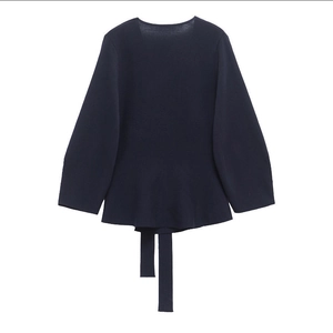 Navy blue long sleeve peplum knit sweater with a matching decorative waist tie