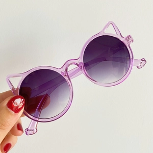 Close-up of translucent purple cat-ear sunglasses for kids and toddlers