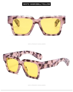 Detailed views of vintage square sunglasses with white tortoiseshell frames and yellow lenses