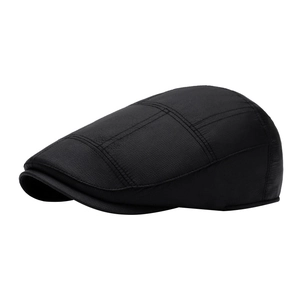 Classic black padded newsboy cap for men featuring a subtle grid texture and retro ivy style