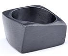 Detail view of a black geometric matte finish stainless steel ring in punk gothic style