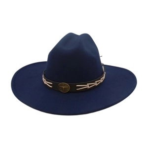 Detail of navy felt cowboy hat with leather band and vintage golden bull head metal badge