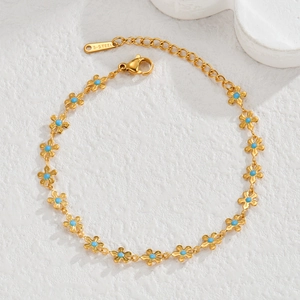 18K gold plated stainless steel daisy bracelet featuring blue turquoise style center beads