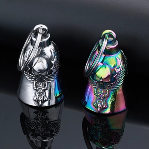 Macro view of silver and rainbow skull with wings stainless steel motorcycle guardian bell