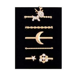 Set of five golden alloy watch band charms with deer, moon and star crystal designs