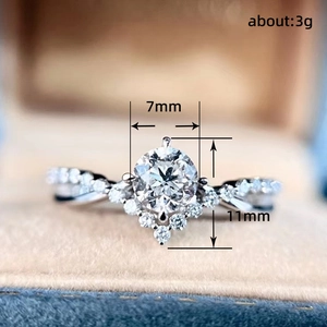 Elegant four-claw crown V-shaped engagement ring with a round diamond and twisted band