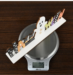 Weight measurement of 74.5g for the Halloween wooden letter table centerpiece