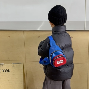 Fashionable red and blue kids crossbody chest bag featuring Cute print on boy model back