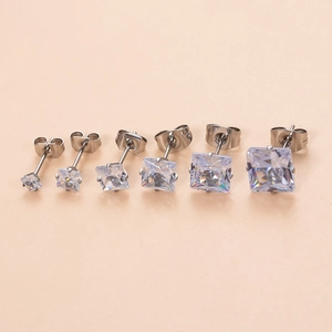 Classic square cz stainless steel stud earrings in six sizes on pink background