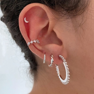 Minimalist S925 silver metal hoop earrings and moon studs set worn on model ear