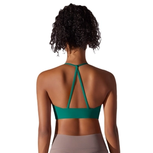 Deep green halter yoga sports bra with cross back straps and high elasticity
