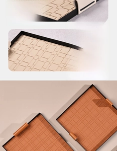 Detail of woven leather surface and black metal frame on modern square storage tray