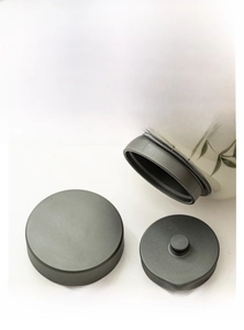 Detail of ceramic tea canister with double-layer aluminum lid for airtight storage
