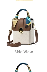 Détail du sac en cuir matelassé marron et blanc avec poignée en foulard de soie