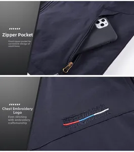 Detail of outdoor utility vest showing zipper chest pocket with phone and embroidered logo