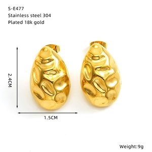 Detail view of 18k gold plated stainless steel hammered earrings with product dimensions