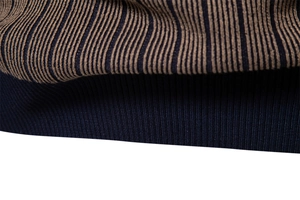 Detail of navy blue and khaki striped knit fabric with ribbed hemline texture