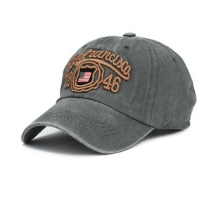 Detailed close-up of 3D embroidery with San Francisco text and US flag on grey baseball cap