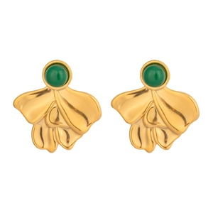 Macro detail of French vintage gold flower earrings with green lapis lazuli stones