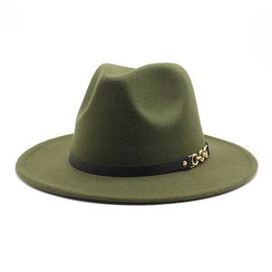 Detail of olive green fedora hat featuring a black faux leather band and gold metal chain buckle