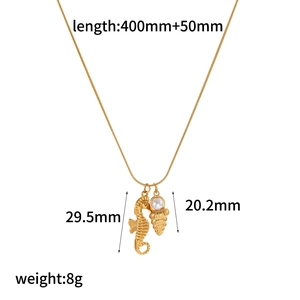 Detail view of gold seahorse and shell pearl pendants with measurements and chain length