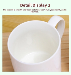 Close-up of polished round rim and smooth white ceramic texture of the coffee mug