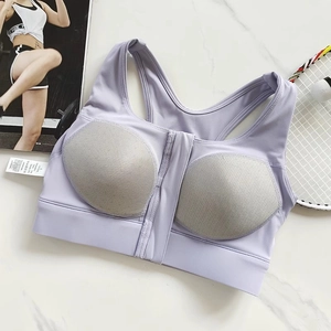 Detailed macro view of light purple sports bra with front zipper and honeycomb mesh pads