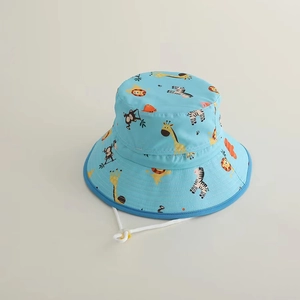 Detailed view of light blue kids sun hat with cartoon animals and adjustable chin strap