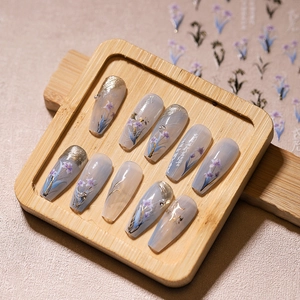 5D stereoscopic iris flower press-on nails in translucent blue with gold foil and pearls