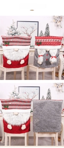Détail de housses de chaise de Noël en peluche avec gnomes rouges et gris pour la fête