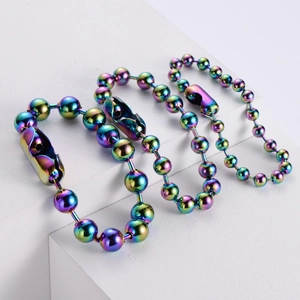 Close-up of rainbow stainless steel bead chains with connectors for DIY jewelry