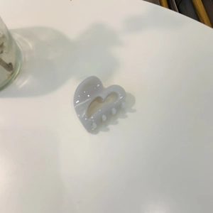 Acetate heart claw clip for women, light purple hair accessory shown on white surface