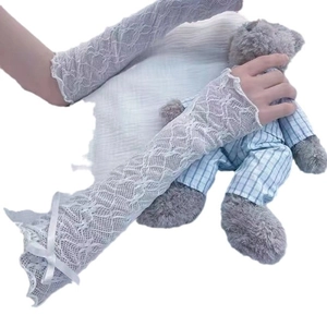 White lace arm sleeves with satin bows for sun protection in sweet Lolita style